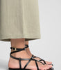 Flat leather sandals with straps