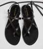 Flat leather sandals with straps